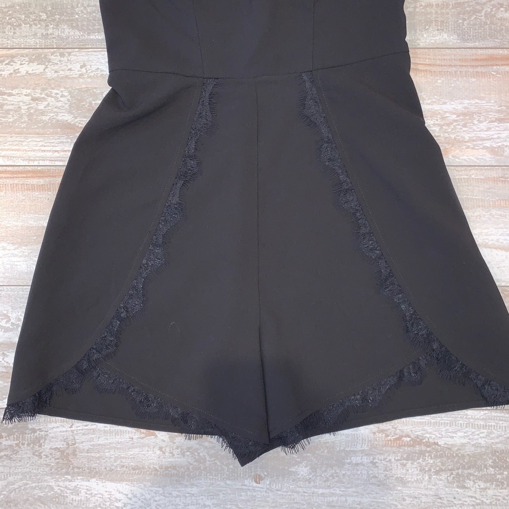 Like new! Bebe Black Strapless Romper - Picture 2 of 6